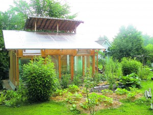 Small office and bioshelter on the Whitman Homestead built largely from recycled materials.