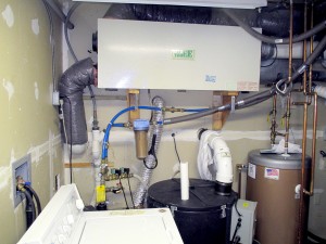 A whole house Energy Recovery Ventilator (ERV).