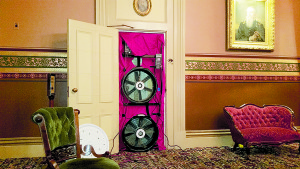 Double blower door test at the Statehouse by Common Sense Energy by Allan Bullis. These efforts resulted in a 35% reduction on the air leakage rate.