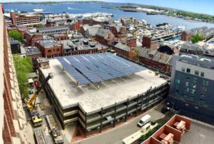 The 193 kW solar canopy at Fore Street Garage in downtown Portland, Maine is the first-of-its-kind in Maine, though solar canopies are common in other parts of the United States. The project is the result of a collaboration between ReVision Energy, East Brown Cow, and Quest Renewables. The clean electricity generated by the system will power the nearby Hyatt Place Hotel, and offset more than 20% of their electrical loads.. Photo: John Capron.