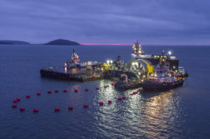The 16-metres-in-diameter turbine is lowered into place from a platform designed by Open-Hydro. Image: Cape Sharp Tidal.