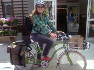 Erin Maile O'Keefe at the Brattleboro Coopon on her Yuba Boda Boda mid-tail bike with electric-assist.