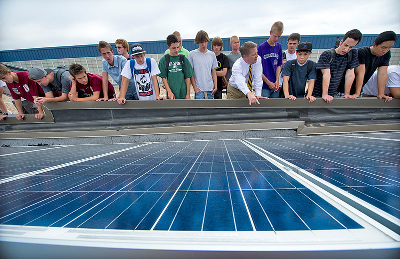 NREL sponsored the “Solar on Schools” program that was adopted by Jeffco Public Schools, the largest district in Colorado. Chatfield High School students learn about photovoltaics on the school’s roof. Credit: Dennis Schroeder