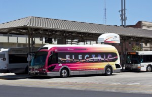 electric bus at a charging station. Photo by SanJoaquinRTD